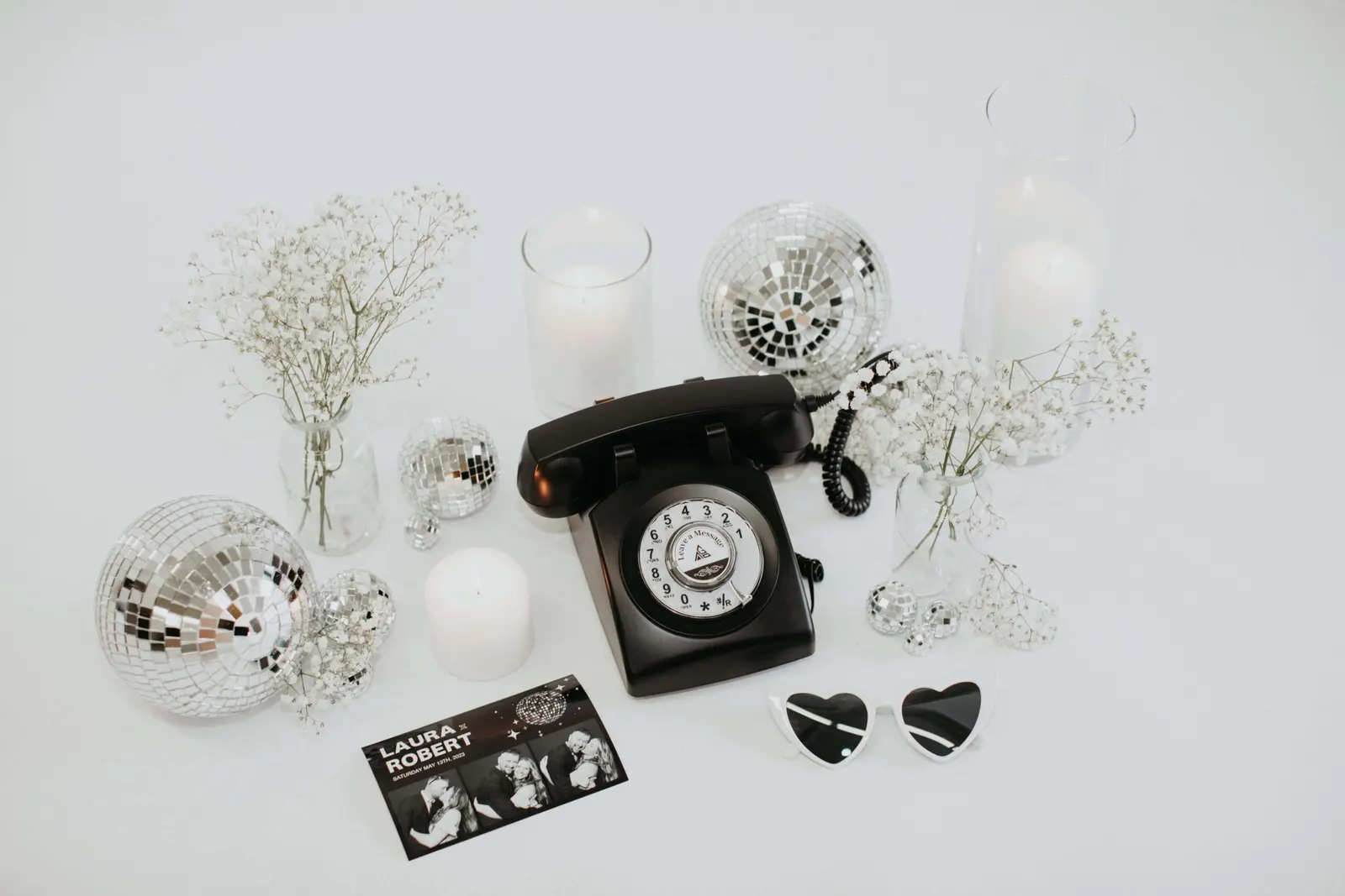 Peach and cream photo booth setup with fresh florals